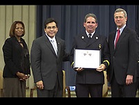 OJP AAG Regina Schofield, AG Alberto Gonzales, Fire Captain Patrick Martin, and Associate AG Robert McCallum.