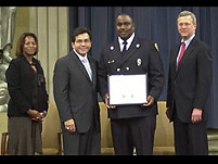 OJP AAG Regina Schofield, AG Alberto Gonzales, Firefighter Stephen Johnson, and Associate AG Robert McCallum.