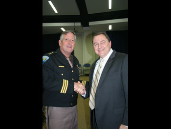 Sheriff Steve Boyer, Kitsap County Sheriff's Office, WA, and OJP Deputy  Assistant Attorney General James H. Burch II.