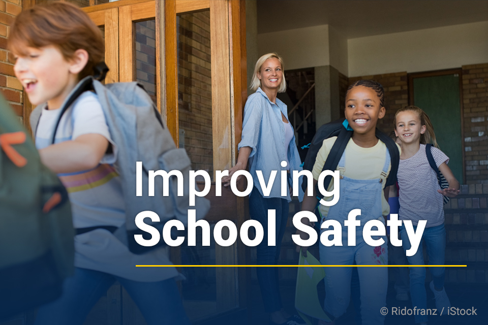 Improving School Safety with happy children in the background