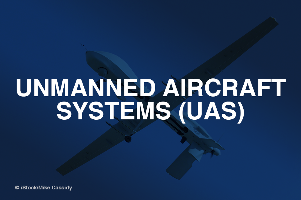 Unmanned Aircraft Systems (UAS) with drone in background