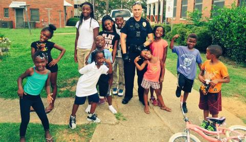 Image of Birmingham Police Officer with community Image of Birmingham Police Officer with community