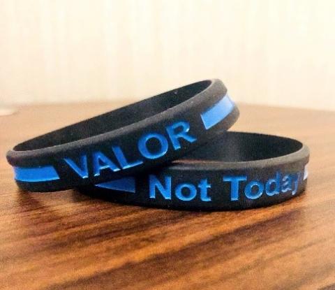 As part of the Not Today Challenge, officers are given wristbands to wear as a reminder of the lessons learned through VALOR training sessions