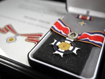 A close-up view of a Badge of Bravery award